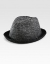 Defined by a slim, leather band this woven fedora is rendered in a superior virgin wool blend, a perfect fit for the distinguished gentleman.Virgin wool/polyamide/silkBrim, about 2Spot cleanImported