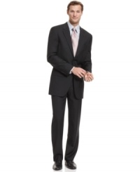 CNeed more versatility from your tailored wardrobe? This solid charcoal suit from Alfani comes with two pairs of flat front pants.