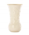 Morning glories spring from ivory porcelain, giving this Lenox Floral Meadow vase a delightfully understated grace. A band of sumptuous gold adds to its classic allure.