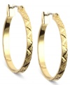 Patterned pizzazz. This set of hoop earrings from Anne Klein is crafted from gold-tone mixed metal and features etchings along the outside for a stylish touch. Approximate diameter: 3/4 inch.