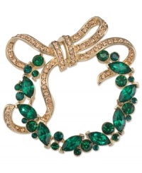 A sign most welcome. This wreath-shaped brooch from Carolee is crafted from gold-tone mixed metal with green and gold-tone details for an inviting approach. Approximate diameter: 2-1/4 inches.