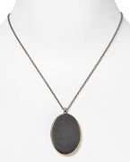 Elizabeth and James put a striking spin on the perennially chic pendant necklace with an oversized onyx station. It's understated design epitomizes edgy elegance.