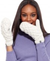 Keep hands completely cozy with these fleece-lined mittens from The North Face. Dressed in classic cable knit, they're at once classic and contemporary.