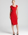 This sculpted Donna Karan New York dress has unique seam detail and a daring front slit for dramatic date night impact.