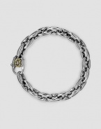 Link-style design in gleaming sterling silver with a signature 18k gold accent clasp. About 8½ long Lobster clasp Made in USA