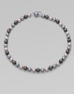 A beautiful multi-color piece with a mabe clasp closure. 8mm organic man-made round grey, nuage and Tahitian pearlsLength, about 18Mabe clasp closure Imported 