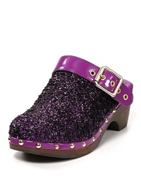 On-trend purple glitter with a buckle detail and bright studs make for a dazzling pair of Juicy clogs.