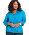 Add instant elegance to your casual wardrobe with Elementz' three-quarter-sleeve plus size top, defined by a faux wrap design.