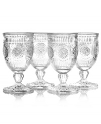 Past meets present. Raised medallions and fluted accents in heavy crystal make Modern Vintage iced beverage glasses a standout addition to any table. From the Godinger drinkware collection.