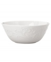 Dressed in elegant white-on-white with an embossed vine motif and interior glaze, this all-purpose bowl from the Opal Innocence Carved dinnerware collection gets your table set for refined dining every day.