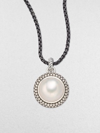 From the Mooonlight Ice Collection. A lustrous white mabe pearl sits center with a dazzling, two-row diamond surround. White mabe pearlDiamonds, 1.36 tcwBlackened sterling silverSize, about ½Imported Please note: Chain sold separately.