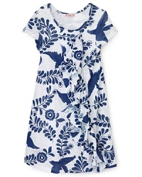 With its interlocking bird pattern and classic shift silhouette, this lovely dress from Little Ella brings her summer look into focus.