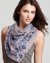 Flocks of birds and floral print decorate this elegant woven scarf from Fraas.