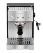 Precision is yours with this programmable espresso machine that expertly compresses coffee automatically for full-bodied taste time and time again. Top your drink off with frothy milk made in quick and mess free with the auto cappuccino function. 1-year warranty. Model XP5280.