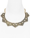 Belle Noel channels gypsy glamor with this plated collar necklace, cast in yellow gold with ornately engraved geometric stations. It's statement style for the Boho trope.