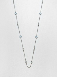 From the Estate Collection. Beautifully faceted blue topaz stone set in intricately designed, sterling silver on a delicate link chain. Blue topazSterling silverLength, about 34Lobster clasp closureImported