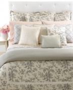 A chain stitch of floral embroidery in elegant diamond latticework adds sleek softness to this pure cotton quilt from Lauren Ralph Lauren. Reverses to solid gray sateen for an impressive transformation in style. (Clearance)