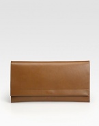 A sleek envelope bag crafted from rich, butter-smooth leather with a contrast exterior pocket on the back.Flap snap closureContrast flat card holder slips into back pocket9½W X 6H X 1½DMade in Italy