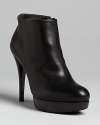 Seeking the perfect work-to-play platform booties? Zip into this Stuart Weitzman design.