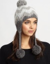 This ultra-soft, ultra-toasty knit hat is crafted in an eye-catching herringbone design with braided straps and pom-poms.Baby alpaca/merino/bambooDry cleanMade in the USA