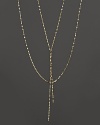 This twisted, glittering gold chain is perfect for adding delicate drama to any look. From Lana.