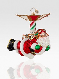 Crafted from individually hand-painted, glitter-dusted glass, Santa found a new means of transportation and it's certainly innovative! Hand-blownHand-painted5½ tallMade in Poland