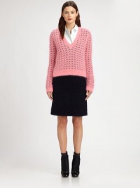 Brightly-hued, butter soft angora, in an open-weave pullover style.Rib-knit V neck, cuffs and hemOpen-weave knit54% wool/37% angora/9% nylonDry cleanMade in Italy of imported fabricModel shown is 5'10 (177cm) wearing US size Small. 