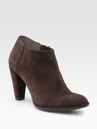 Supple suede with a chunky stacked heel and an easy-access side zipper. Self-covered heel, 4 (100mm) Suede upper Leather lining Buffed leather sole Padded insole ImportedOUR FIT MODEL RECOMMENDS ordering one half size up as this style runs small. 