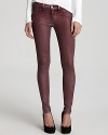 Metallic-coated J Brand skinny jeans strut into the new season with trendsetting shine in a casual low-rise silhouette.