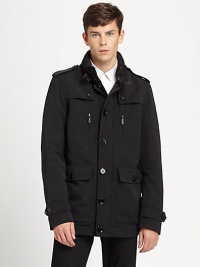 A clean silhouette tailored in performance nylon for a modern edge against the elements, it features a stand collar, shoulder epaulettes and spacious front pockets.Button frontStand collarShoulder epaulettesZippered chest pocketWaist flap pocketsBack ventFully linedAbout 30 from shoulder to hemNylonDry cleanImported