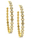 Fashion with an edge. Vince Camuto's open hoop earrings are crafted from gold-tone mixed metal with glass crystal accents on a jagged silhouette. The earrings feature a post with friction back closure. Approximate drop: 2 inches.