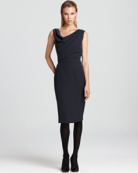 Make a modern cocktail statement upon entry and exit in this Armani Collezioni dress, flaunting an asymmetric cowl neck and draped cowl back. The refined look is ravishing with a small box clutch and glossy heels.