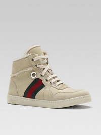 A lace-up, high-top silhouette crafted in supple suede with signature stripes and shearling lining.Lace-upSuede upperShearling liningRubber solePadded insoleMade in Italy