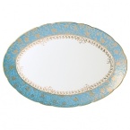 Inspired by the flamboyant designs of the 19th century, Eden Turquoise is both refined and sophisticated. This Limoges porcelain dinnerware service is a remarkable reproduction that captures the beauty of engraved gold work. Made in Limoges, France.