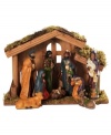 Adorning onlookers peer at the new born Baby Jesus in this Ethnic nativity scene, perfect for anywhere in the home to remind friends and family of the true miracle of Christmas.