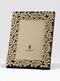 Yellow Swarovski crystals shimmer on the floral garland that surrounds this rich leather design.Classic beveled glassStretched leather backingGift boxedImported