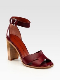 Flawless leather silhouette has an adjustable ankle strap, criss-cross straps and a wide, stacked heel. Stacked heel, 4 (100mm)Leather upperLeather lining and solePadded insoleImportedOUR FIT MODEL RECOMMENDS ordering true size. 