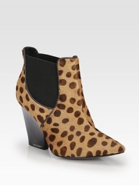 A strong stacked heel lifts this feline-inspired ankle boot of leopard-print calf hair, with leather trim and easy elastic panels. Stacked heel, 3¾ (95mm)Leopard-print calf hair upper with leather trim and side elastic panelsPull-on styleLeather lining and solePadded insoleImported