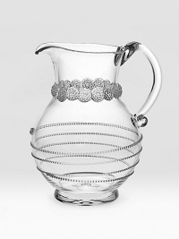 Ornate and elegant glass for holding beverages or a bouquet. Mouth blown 9½H; holds 80oz Dishwasher safe Made in Czech Republic