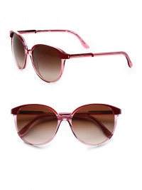 This tonal design features a classic shape with contemporary appeal. Available in violet/transparent pink with brown gradient lens or beige/crystal with brown gradient lens. Logo temples100% UV protectionMade in Italy 