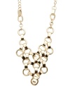 Lovely links. GUESS's intricate bib-style necklace adds the drama factor with its pretty gold tone mixed metal setting and chunky design. Approximate length: 16 inches + 2-inch extender. Approximate drop: 3-1/4 inches.