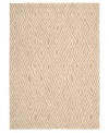 Diamond cut. A distinctive all-over diamond design and soft beige background evoke the rings from the trunk of an ancient tree. Hand tufted from 100% natural wool, this plush Calvin Klein area rug is crafted using the cut-and-loop pile technique that creates a unique matte surface texture.