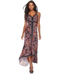 INC's stunning maxi dress always fits the bill, whether it's a night out on the town or a special occasion to celebrate! The exotic print and handkerchief hem give this look extra flair.