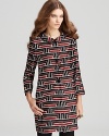 Stop traffic from commute to corner office in a boldly printed kate spade new york coat, featuring chic bracelet sleeves and a luxurious silk silhouette for an impeccably polished look.