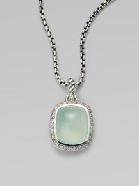 From the Noblesse Collection. A beautiful center stone of aqua chalcedony surrounded by a row of brilliant diamonds on a sterling silver box link chain. Aqua chalcedonyDiamonds, .3 tcwSterling silverLength, about 17Pendant size, about ½Lobster clasp closureImported 