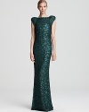 Turn around in this show-stopping ABS by Allen Schwartz sequin gown to reveal a sultry open back.