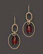 Faceted garnet adds rich sparkle to links of 14K yellow gold. By Nancy B.