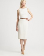 Both timeless and modern, this chic crepe design features a slender leather belt woven through metal grommets at the waist.Jewel necklineSleevelessMetal grommets at waistIncluded leather beltBack ventBack zipAbout 32 from natural waist99% wool/1% spandexDry cleanMade in ItalyModel shown is 5'10 (177cm) wearing US size 4. 