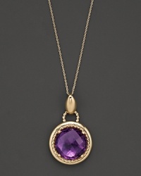 An expertly rendered faceted round amethyst pendant set in 14 Kt. gold, with fine link chain.