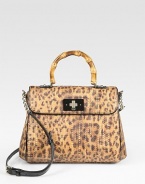 Leopard-printed raffia mixes with bamboo and patent leather accents for an instantly chic flap-top design. Bamboo top handle, 4¼ dropAdjustable detachable patent leather shoulder strap, 18½-21 dropTurnlock flap closureProtective metal feetOne inside zip pocketTwo inside open pocketsFully lined10¼W X 8H X 3DImported